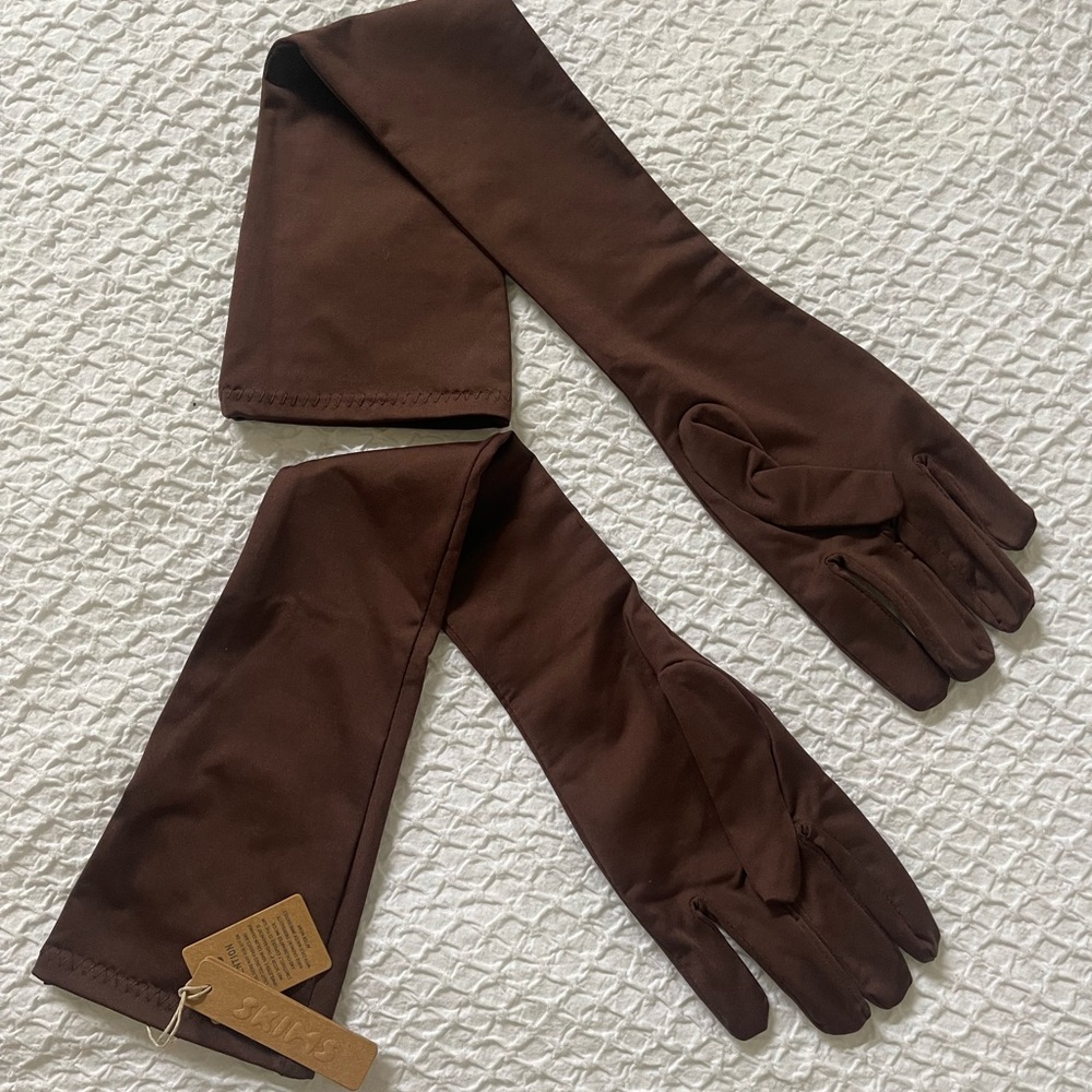 Skims swim gloves